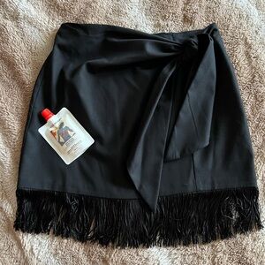 Black mini skirt with fringe
